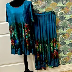 NWOT Two piece summer fun. Tunic with matching capri. Perfect condition. 1X